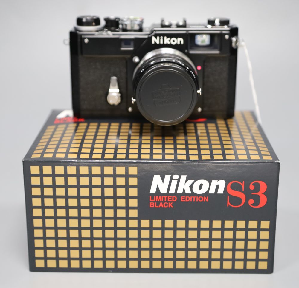 A Nikon S3 Limited Edition block range finder camera, serial no 303307 with Nikkor F/1.4 500mm lens, boxed, unused